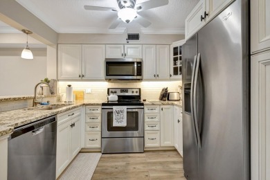 Very Clean freshly painted unit with new modern flooring on Polo Trace Golf Club in Florida - for sale on GolfHomes.com, golf home, golf lot