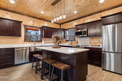 Prime-location luxury STR cabin w/INDOOR POOL, MOVIE THEATER on Sevierville Golf Club in Tennessee - for sale on GolfHomes.com, golf home, golf lot