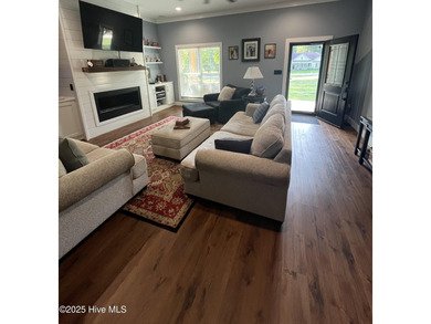 Welcome to beautiful home on large lot in gated community of on River Golf and Country Club at Lake Royale in North Carolina - for sale on GolfHomes.com, golf home, golf lot