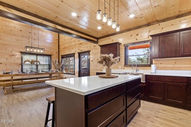 Prime-location luxury STR cabin w/INDOOR POOL, MOVIE THEATER on Sevierville Golf Club in Tennessee - for sale on GolfHomes.com, golf home, golf lot