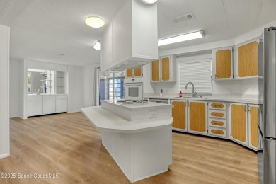 WELCOME TO THIS 2 BEDROOM 2 BATHROOM HOME IN LOVELY BAREFOOT on Barefoot Bay Golf Course in Florida - for sale on GolfHomes.com, golf home, golf lot