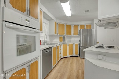 WELCOME TO THIS 2 BEDROOM 2 BATHROOM HOME IN LOVELY BAREFOOT on Barefoot Bay Golf Course in Florida - for sale on GolfHomes.com, golf home, golf lot