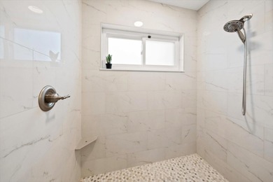 West-facing golf course views and sunset exposure define this on Countryside Country Club in Florida - for sale on GolfHomes.com, golf home, golf lot