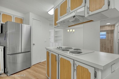WELCOME TO THIS 2 BEDROOM 2 BATHROOM HOME IN LOVELY BAREFOOT on Barefoot Bay Golf Course in Florida - for sale on GolfHomes.com, golf home, golf lot