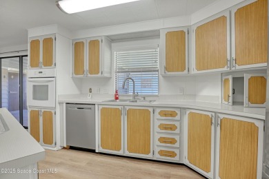 WELCOME TO THIS 2 BEDROOM 2 BATHROOM HOME IN LOVELY BAREFOOT on Barefoot Bay Golf Course in Florida - for sale on GolfHomes.com, golf home, golf lot