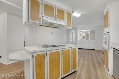 WELCOME TO THIS 2 BEDROOM 2 BATHROOM HOME IN LOVELY BAREFOOT on Barefoot Bay Golf Course in Florida - for sale on GolfHomes.com, golf home, golf lot
