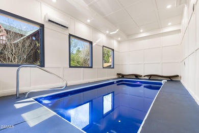 Prime-location luxury STR cabin w/INDOOR POOL, MOVIE THEATER on Sevierville Golf Club in Tennessee - for sale on GolfHomes.com, golf home, golf lot