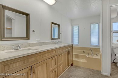 WELCOME TO THIS 2 BEDROOM 2 BATHROOM HOME IN LOVELY BAREFOOT on Barefoot Bay Golf Course in Florida - for sale on GolfHomes.com, golf home, golf lot