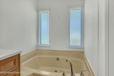 WELCOME TO THIS 2 BEDROOM 2 BATHROOM HOME IN LOVELY BAREFOOT on Barefoot Bay Golf Course in Florida - for sale on GolfHomes.com, golf home, golf lot