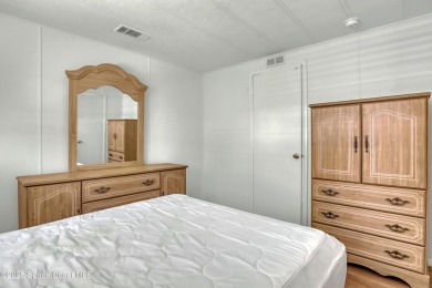 WELCOME TO THIS 2 BEDROOM 2 BATHROOM HOME IN LOVELY BAREFOOT on Barefoot Bay Golf Course in Florida - for sale on GolfHomes.com, golf home, golf lot