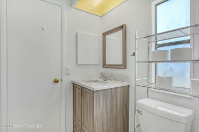 WELCOME TO THIS 2 BEDROOM 2 BATHROOM HOME IN LOVELY BAREFOOT on Barefoot Bay Golf Course in Florida - for sale on GolfHomes.com, golf home, golf lot