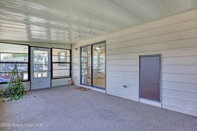 WELCOME TO THIS 2 BEDROOM 2 BATHROOM HOME IN LOVELY BAREFOOT on Barefoot Bay Golf Course in Florida - for sale on GolfHomes.com, golf home, golf lot