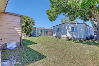 WELCOME TO THIS 2 BEDROOM 2 BATHROOM HOME IN LOVELY BAREFOOT on Barefoot Bay Golf Course in Florida - for sale on GolfHomes.com, golf home, golf lot