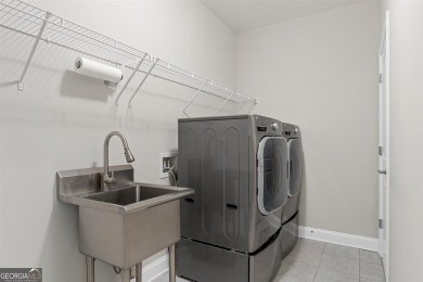 IF YOU EVER WANTED TO LIVE IN AN ELEGANT MODEL HOME W/BEAUTIFUL on The Governors Towne Club in Georgia - for sale on GolfHomes.com, golf home, golf lot