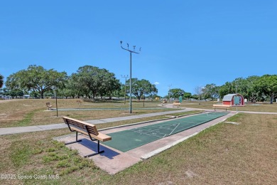 WELCOME TO THIS 2 BEDROOM 2 BATHROOM HOME IN LOVELY BAREFOOT on Barefoot Bay Golf Course in Florida - for sale on GolfHomes.com, golf home, golf lot
