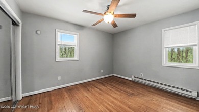 Located in a premier STR-friendly community, this home offers on Pocono Farms Country Club in Pennsylvania - for sale on GolfHomes.com, golf home, golf lot