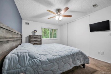 This charming two-bedroom, one-bath Condo exemplifies easy on Holbrook Country Club Golf Course in New York - for sale on GolfHomes.com, golf home, golf lot