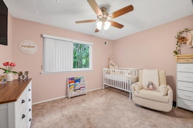 This charming two-bedroom, one-bath Condo exemplifies easy on Holbrook Country Club Golf Course in New York - for sale on GolfHomes.com, golf home, golf lot