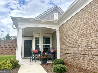 Imagine starting your mornings with coffee on a covered lanai on Canongate Golf At Sun City Peachtree in Georgia - for sale on GolfHomes.com, golf home, golf lot