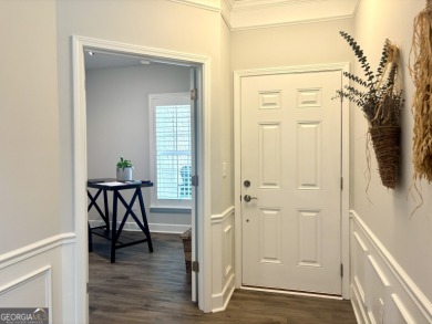 Imagine starting your mornings with coffee on a covered lanai on Canongate Golf At Sun City Peachtree in Georgia - for sale on GolfHomes.com, golf home, golf lot