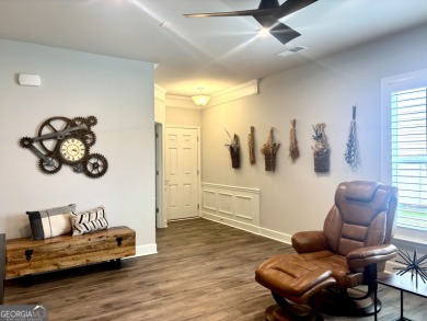 Imagine starting your mornings with coffee on a covered lanai on Canongate Golf At Sun City Peachtree in Georgia - for sale on GolfHomes.com, golf home, golf lot