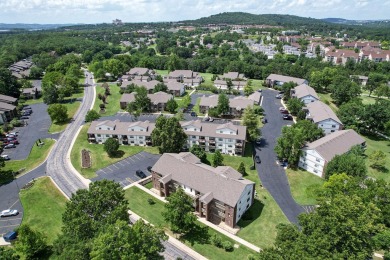 This FULLY FURNISHED 2 bedroom 2 bath condo is located  in the on Pointe Royale Village Country Club in Missouri - for sale on GolfHomes.com, golf home, golf lot