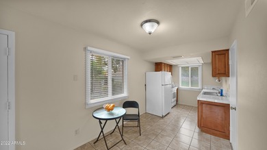 Charming 2 bed 1 bath single level townhome with large east on Scottsdale Silverado Golf Club in Arizona - for sale on GolfHomes.com, golf home, golf lot