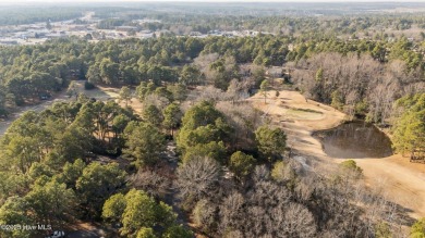 Large golf front lot on a cul-de-sac with great views of the 4th on Seven Lakes Country Club in North Carolina - for sale on GolfHomes.com, golf home, golf lot