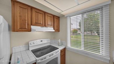 Charming 2 bed 1 bath single level townhome with large east on Scottsdale Silverado Golf Club in Arizona - for sale on GolfHomes.com, golf home, golf lot