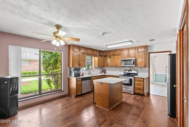 Welcome to this inviting pool home nestled in the desirable and on Blue Cypress Golf Club in Florida - for sale on GolfHomes.com, golf home, golf lot