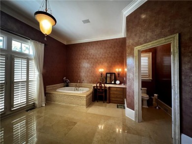 This European style all-sided brick house is located in one of on Country Club of the South in Georgia - for sale on GolfHomes.com, golf home, golf lot
