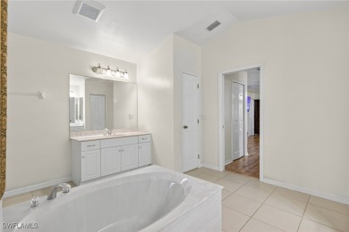 GOLF COURSE LIVING AT ITS FINEST - FULLY FURNISHED & on Coral Oaks Golf Course in Florida - for sale on GolfHomes.com, golf home, golf lot