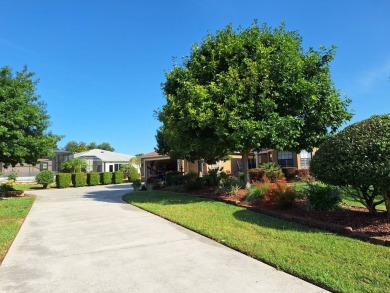 Imagine living the ideal retired life - this signature home on a on Summerglen Country Club in Florida - for sale on GolfHomes.com, golf home, golf lot