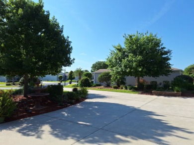 Imagine living the ideal retired life - this signature home on a on Summerglen Country Club in Florida - for sale on GolfHomes.com, golf home, golf lot