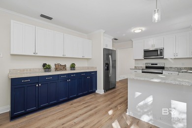 Affectionately known by neighbors as *The Crepe Myrtle House* on Azalea City Golf Course in Alabama - for sale on GolfHomes.com, golf home, golf lot