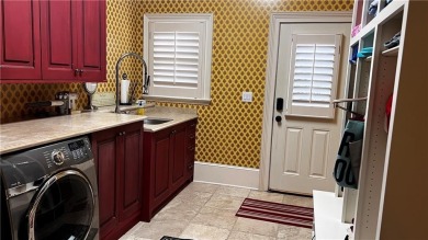 This European style all-sided brick house is located in one of on Country Club of the South in Georgia - for sale on GolfHomes.com, golf home, golf lot