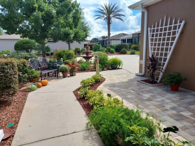 Imagine living the ideal retired life - this signature home on a on Summerglen Country Club in Florida - for sale on GolfHomes.com, golf home, golf lot