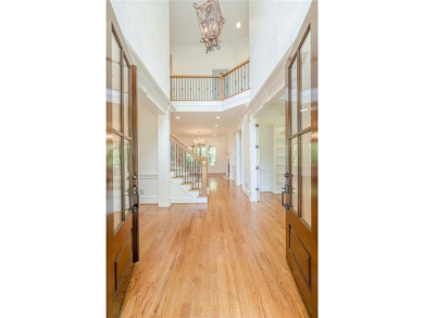 EXPERIENCE THE PINNACLE OF LUXURY LIVING IN THIS COMPETITIVELY on Manor Golf and Country Club in Georgia - for sale on GolfHomes.com, golf home, golf lot