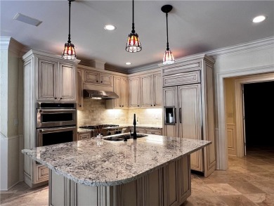This European style all-sided brick house is located in one of on Country Club of the South in Georgia - for sale on GolfHomes.com, golf home, golf lot