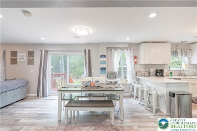 This beautifully renovated 3-bedroom, 3-bathroom home is the on Pocono Farms Country Club in Pennsylvania - for sale on GolfHomes.com, golf home, golf lot