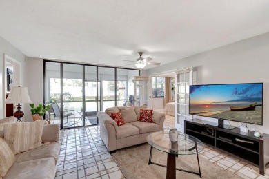 Welcome to this charming first-floor condo located in the on Fountains Golf and Country Club in Florida - for sale on GolfHomes.com, golf home, golf lot