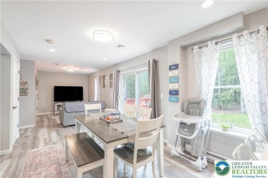 This beautifully renovated 3-bedroom, 3-bathroom home is the on Pocono Farms Country Club in Pennsylvania - for sale on GolfHomes.com, golf home, golf lot