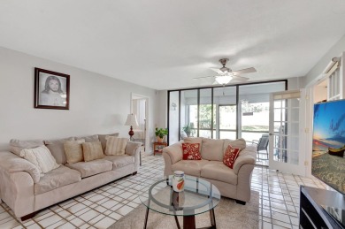 Welcome to this charming first-floor condo located in the on Fountains Golf and Country Club in Florida - for sale on GolfHomes.com, golf home, golf lot