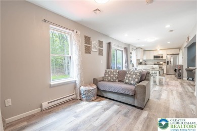 This beautifully renovated 3-bedroom, 3-bathroom home is the on Pocono Farms Country Club in Pennsylvania - for sale on GolfHomes.com, golf home, golf lot