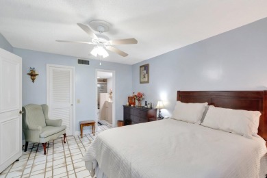 Welcome to this charming first-floor condo located in the on Fountains Golf and Country Club in Florida - for sale on GolfHomes.com, golf home, golf lot