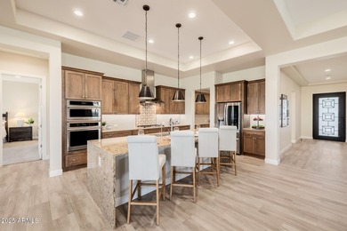 Experience luxury living at its finest in this stunning on Tuscany Falls At Pebble Creek in Arizona - for sale on GolfHomes.com, golf home, golf lot