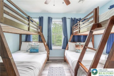 This beautifully renovated 3-bedroom, 3-bathroom home is the on Pocono Farms Country Club in Pennsylvania - for sale on GolfHomes.com, golf home, golf lot