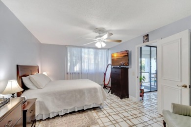 Welcome to this charming first-floor condo located in the on Fountains Golf and Country Club in Florida - for sale on GolfHomes.com, golf home, golf lot