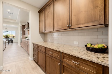 Experience luxury living at its finest in this stunning on Tuscany Falls At Pebble Creek in Arizona - for sale on GolfHomes.com, golf home, golf lot