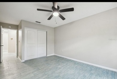 One or more photo(s) has been virtually staged. THREE BEDROOM on Seven Springs Golf and Country Club in Florida - for sale on GolfHomes.com, golf home, golf lot